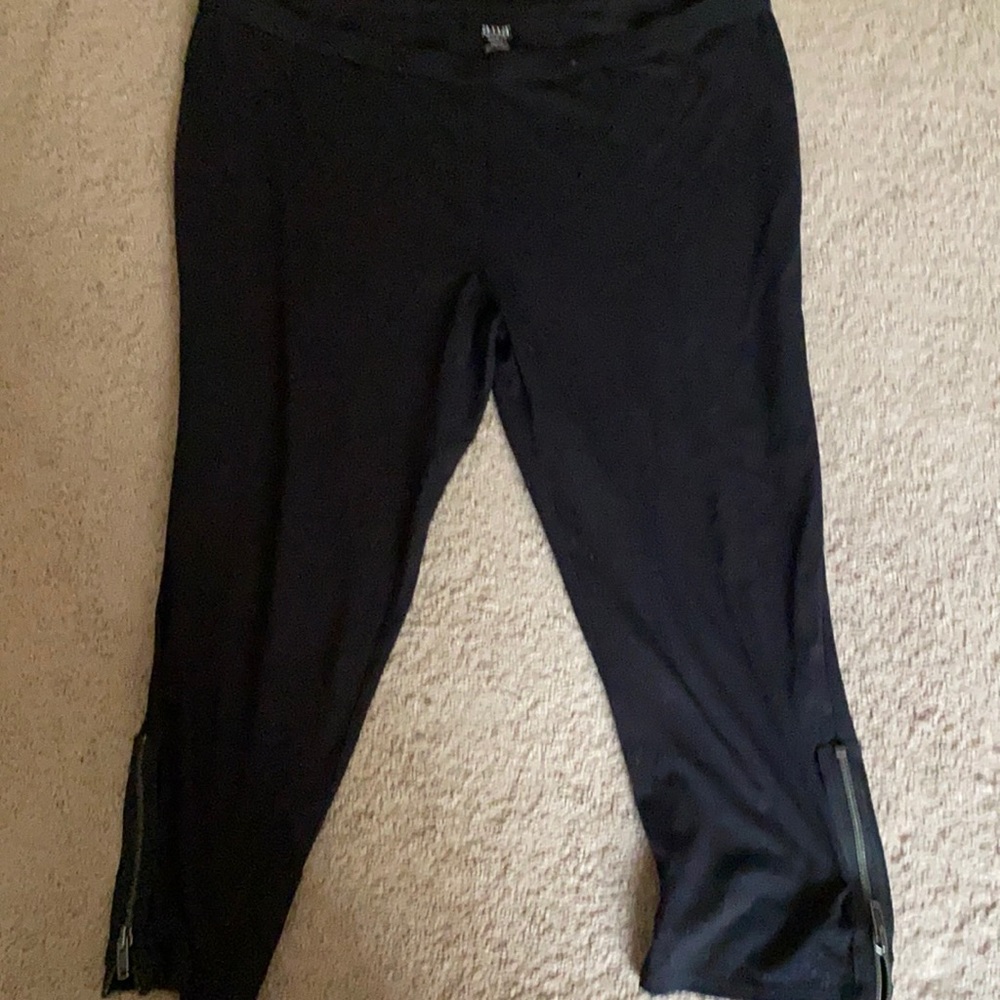 Black leggings with zippers on the sides